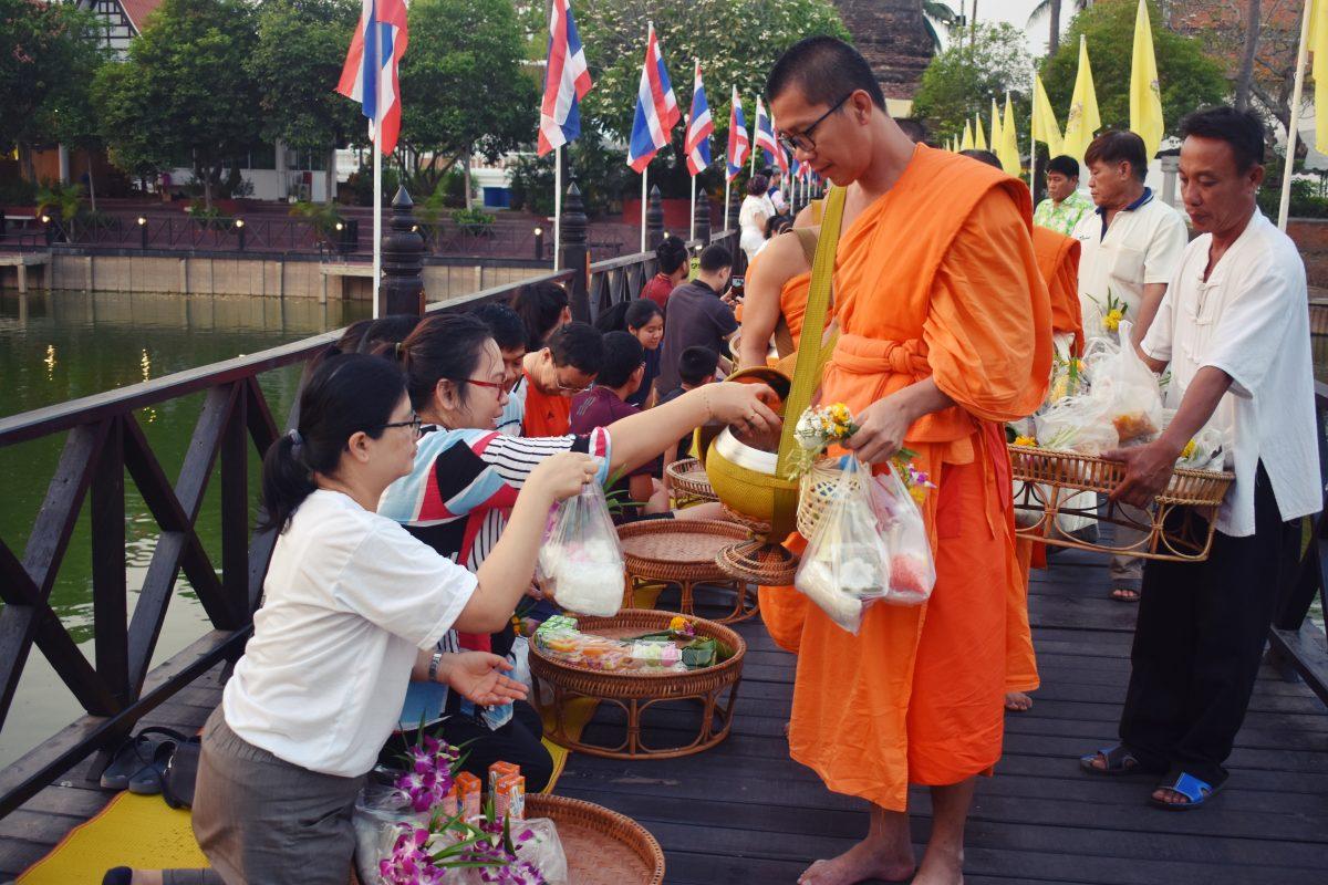 giving alms to monks